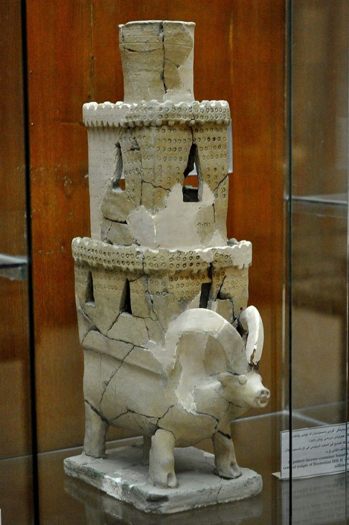 clay incense burner featuring a ram with a tower on his back